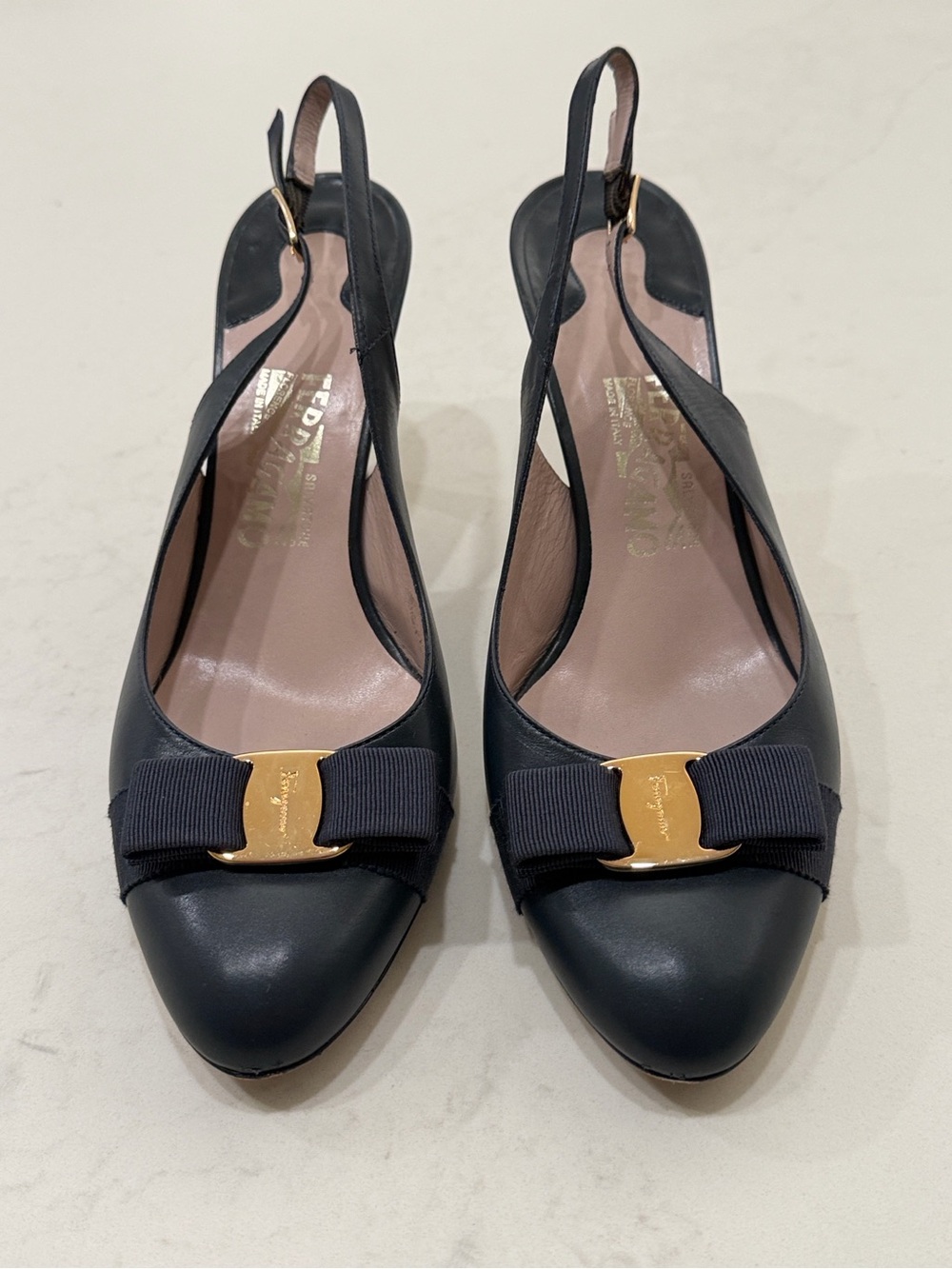 Salvatore Ferragamo Black Leather Slingback Pumps with Gold Bow Plaque
